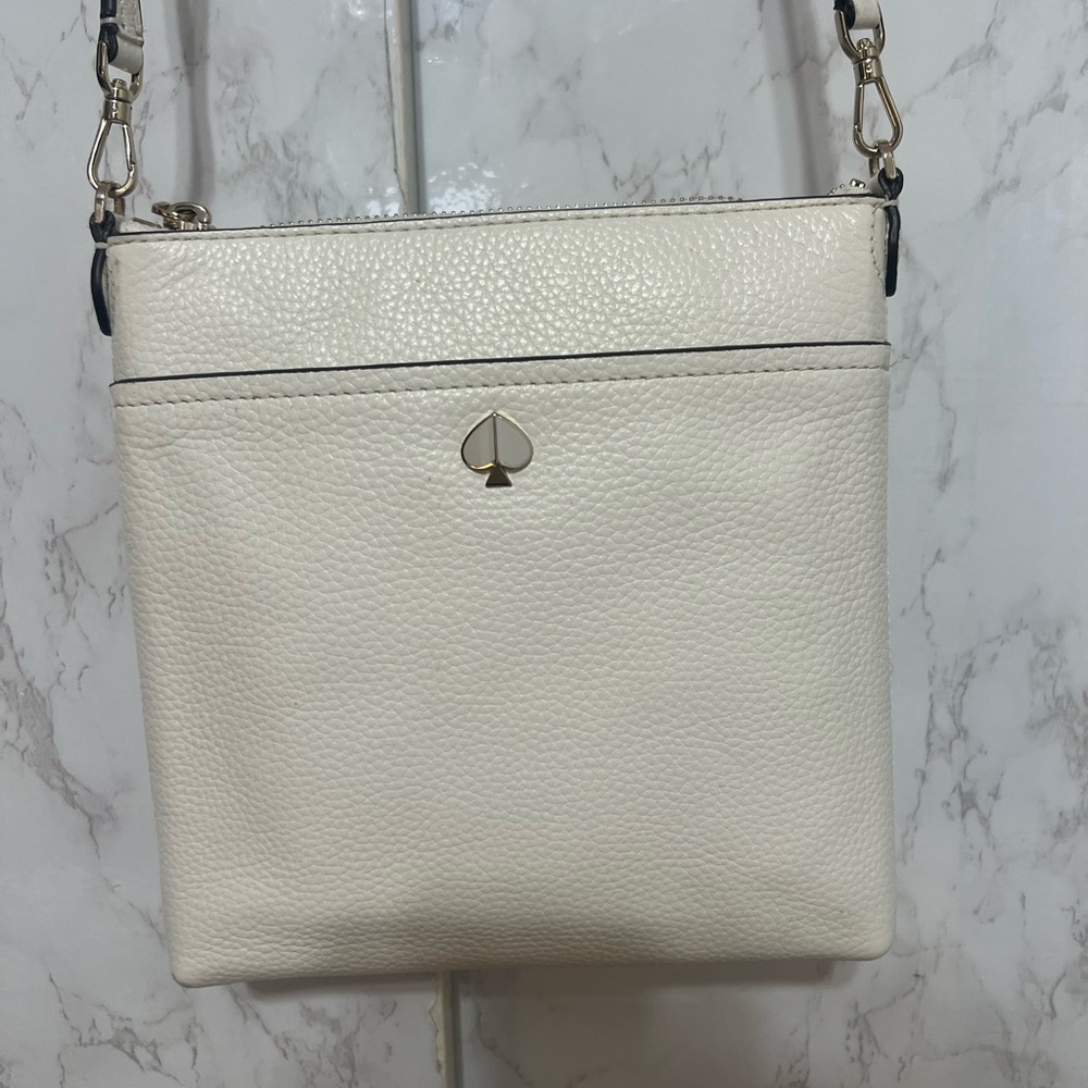kate spade Cream Leather Crossbody with Black Trim and Gold Spade Accent (used)